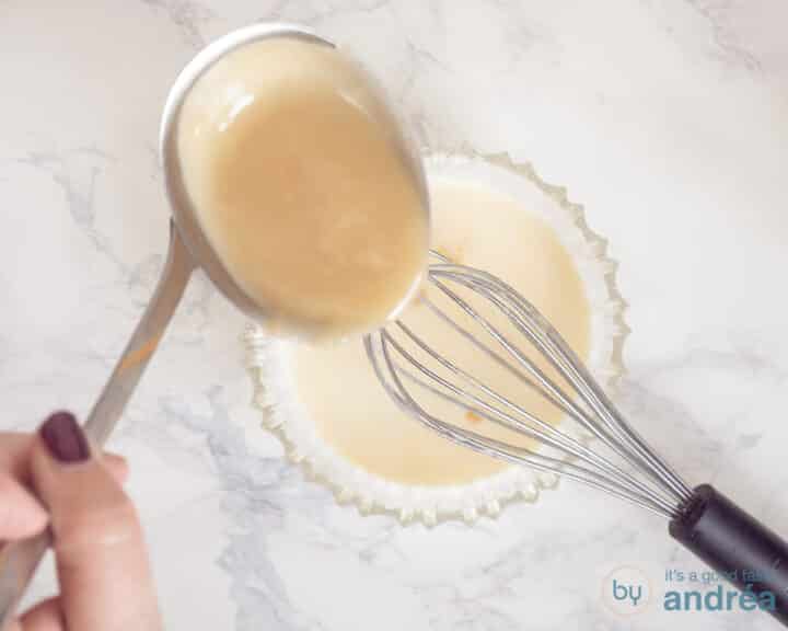 A tablespoon of thickened chicken soup is added to the egg and cream mixture.