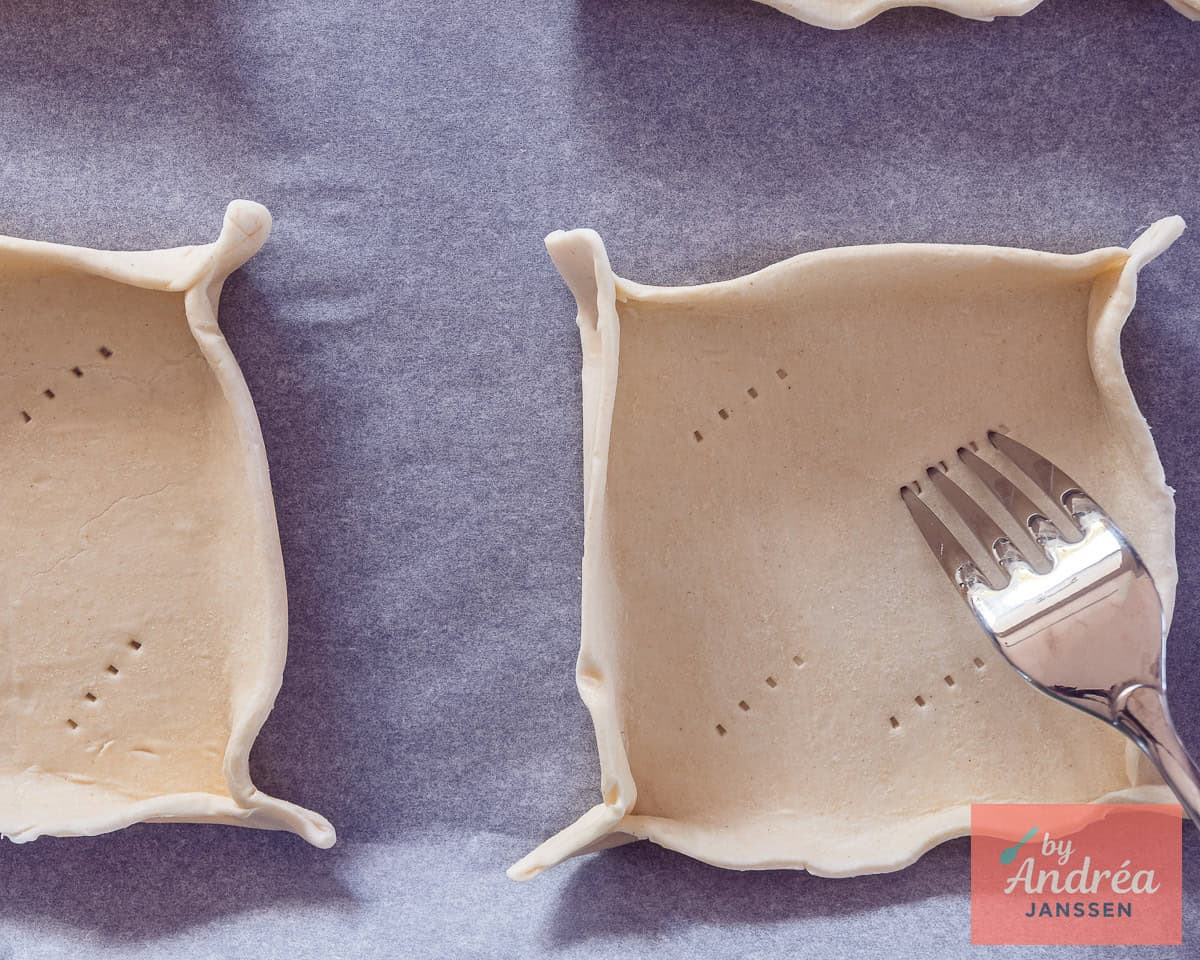 Folded puff pastry cups. Prick air holes with a fork.