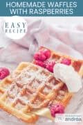 Two waffles on a glass dish with raspberries and mascarpone. A text above: easy recipe, homemade waffles with raspberries