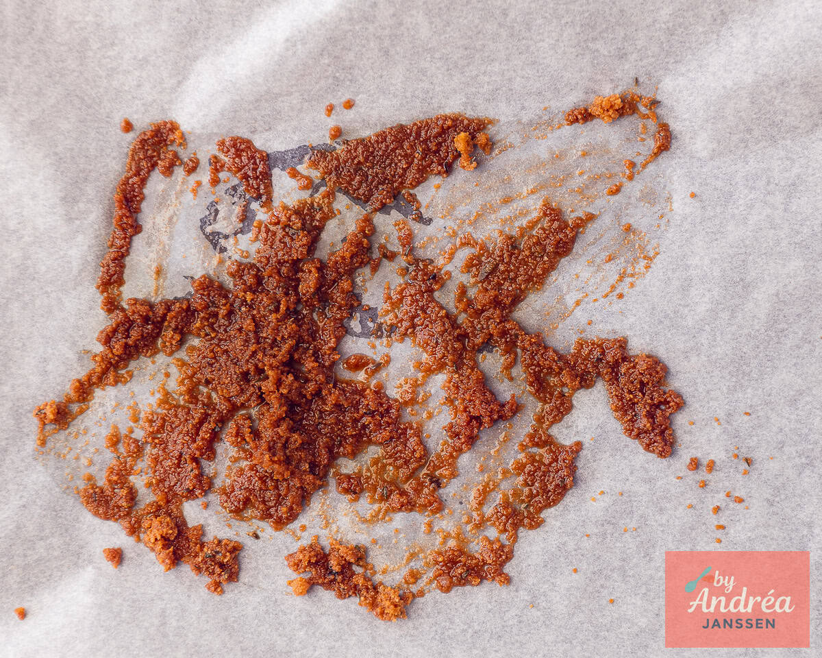 A baking tray with herb breadcrumbs baked in the oven.