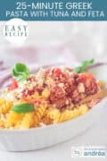 A portion of a white baking dish filled with fusilli, tuna, tomato sauce, and feta. A text: easy recipe, 20-Minute Greek Fusilli with Tuna and Feta
