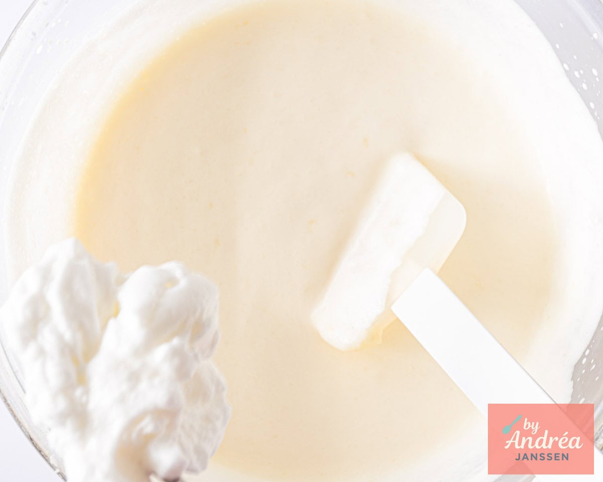 Add whipped egg whites to the cream