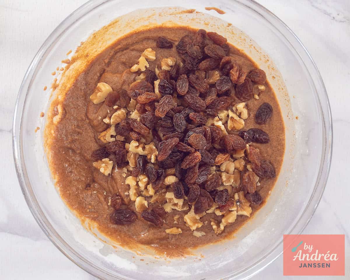 Gingerbread batter to which currants and walnuts have been added.