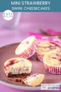 Mini strawberry cheesecake cupcakes on a pink platter. A text above: easy recipe, mini strawberry swirl cupcakes