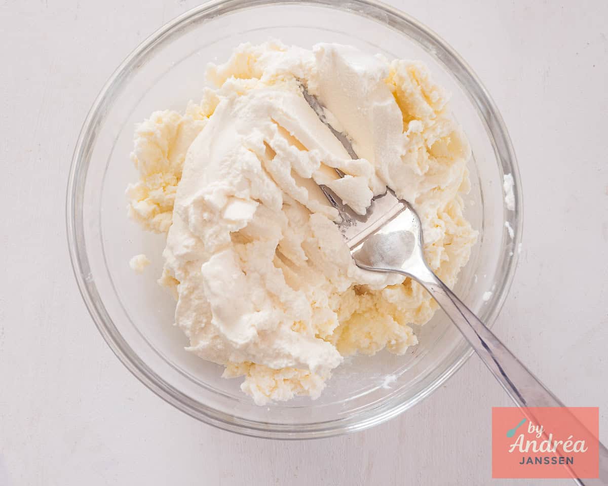 Mix ricotta and mozzarella cheese