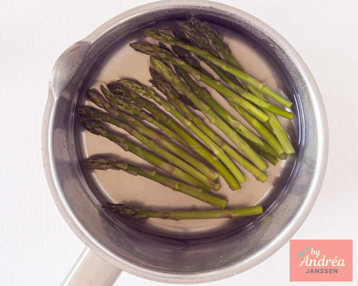 Green asparagus in a saucepan