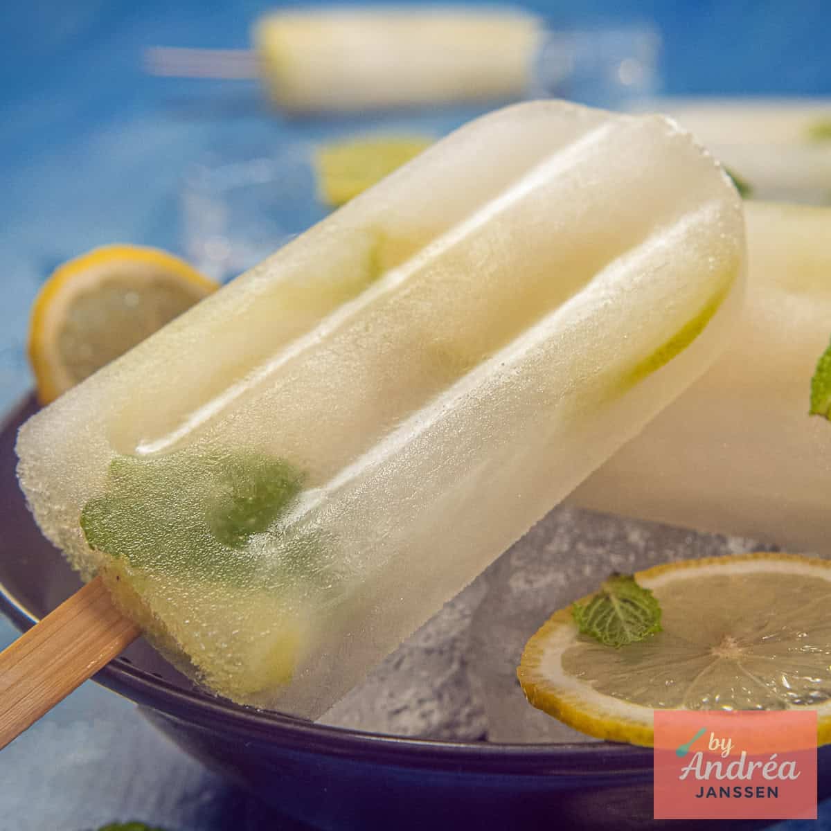 A square photo with Fresh Lemon Ice Pops for Warm Days