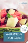 Half a bowl filled with fruit salad, text: watermelon fruit basket, easy recipe
