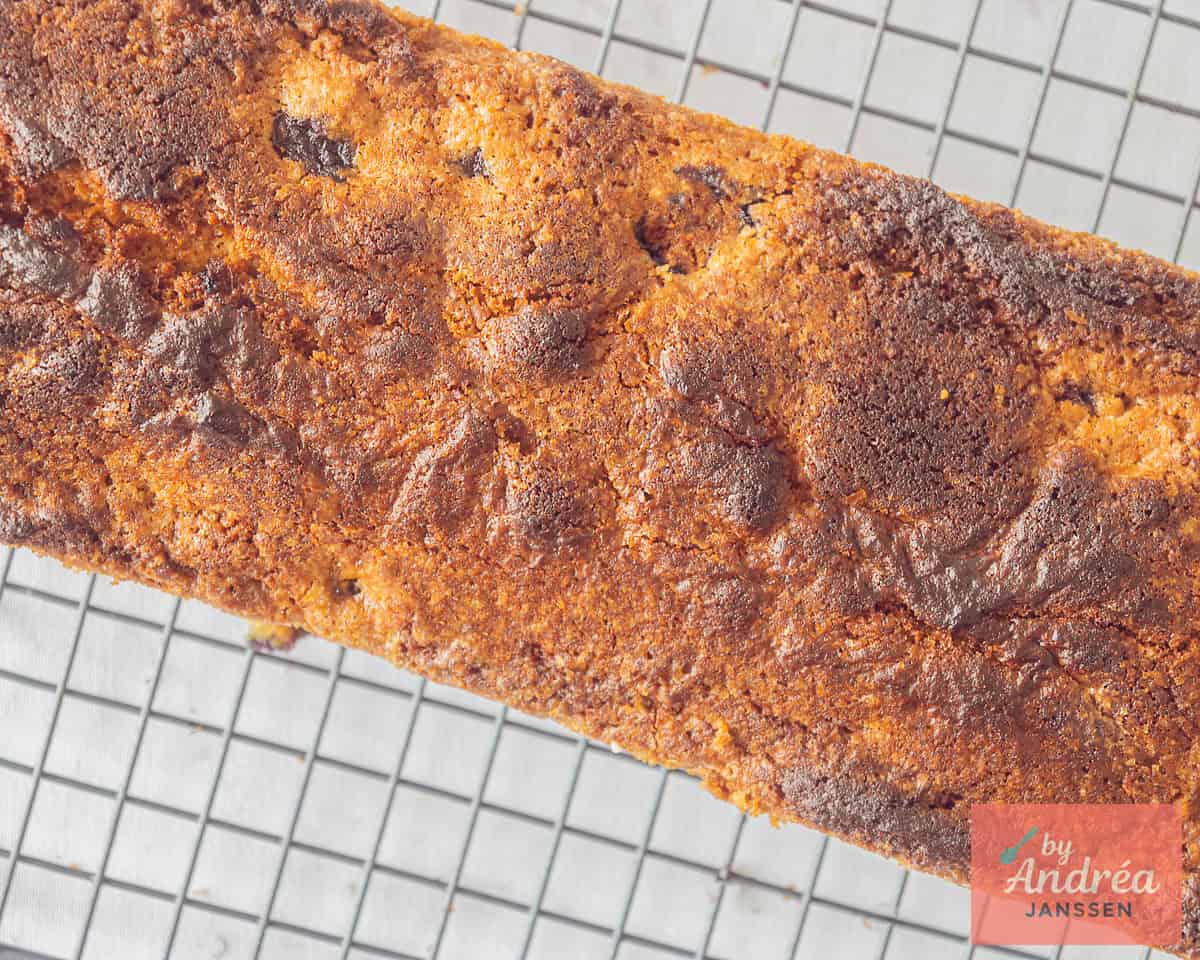 Cake baked out of the oven and cooling on a rack