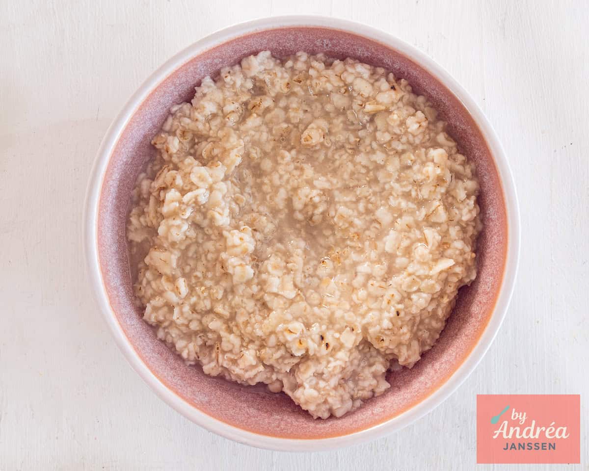 A pink bowl of oatmeal