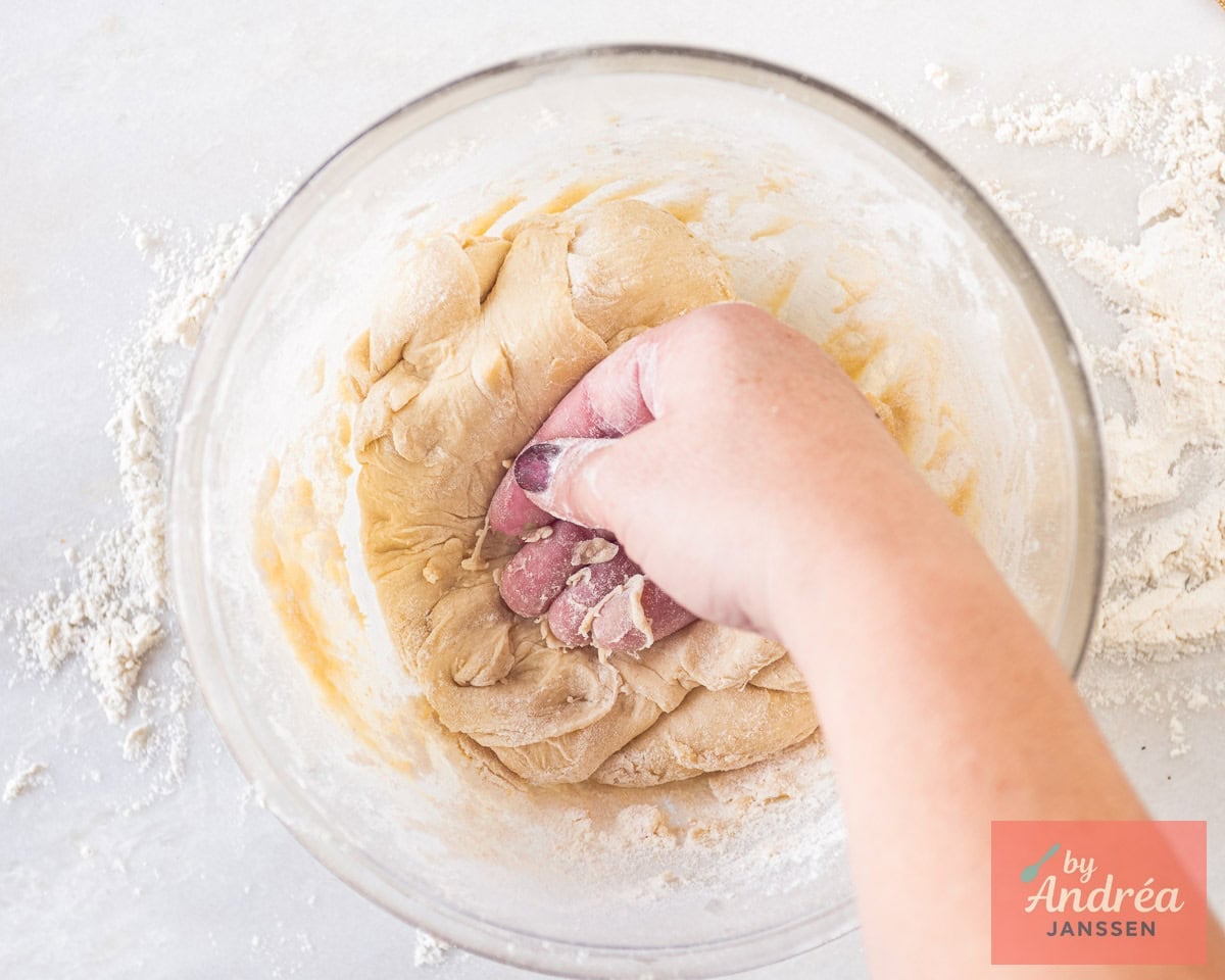 Kneaded dough in a glass bowl