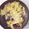 Stew the finely chopped cabbage in the butter in a pan.