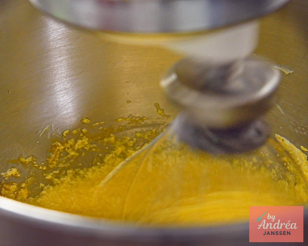 Butter, sugar, and egg are mixed in the mixer.