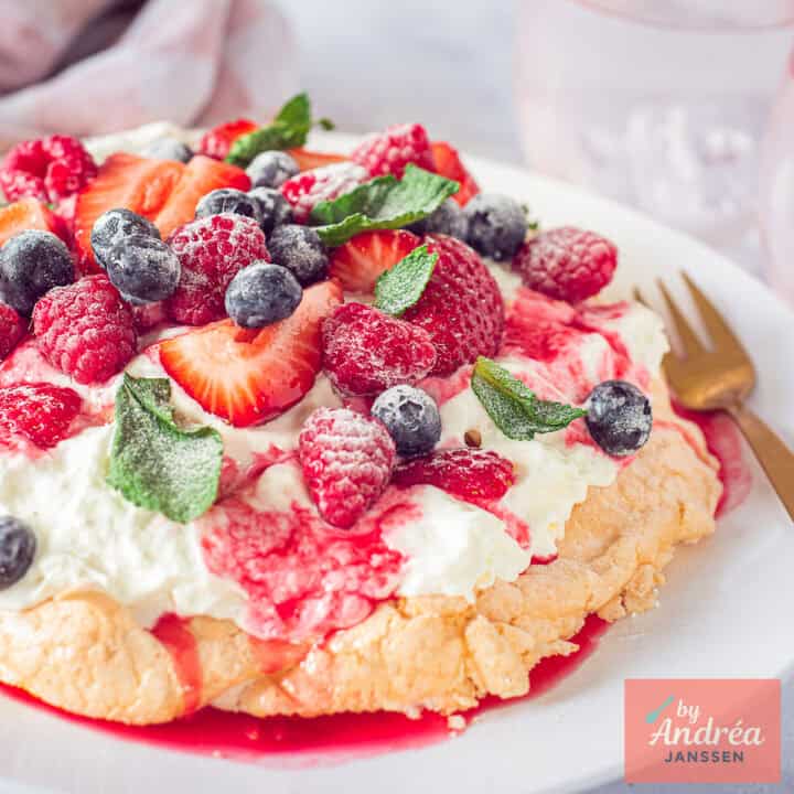 Crunchy Pavlova with Whipped Cream and Mixed Berries