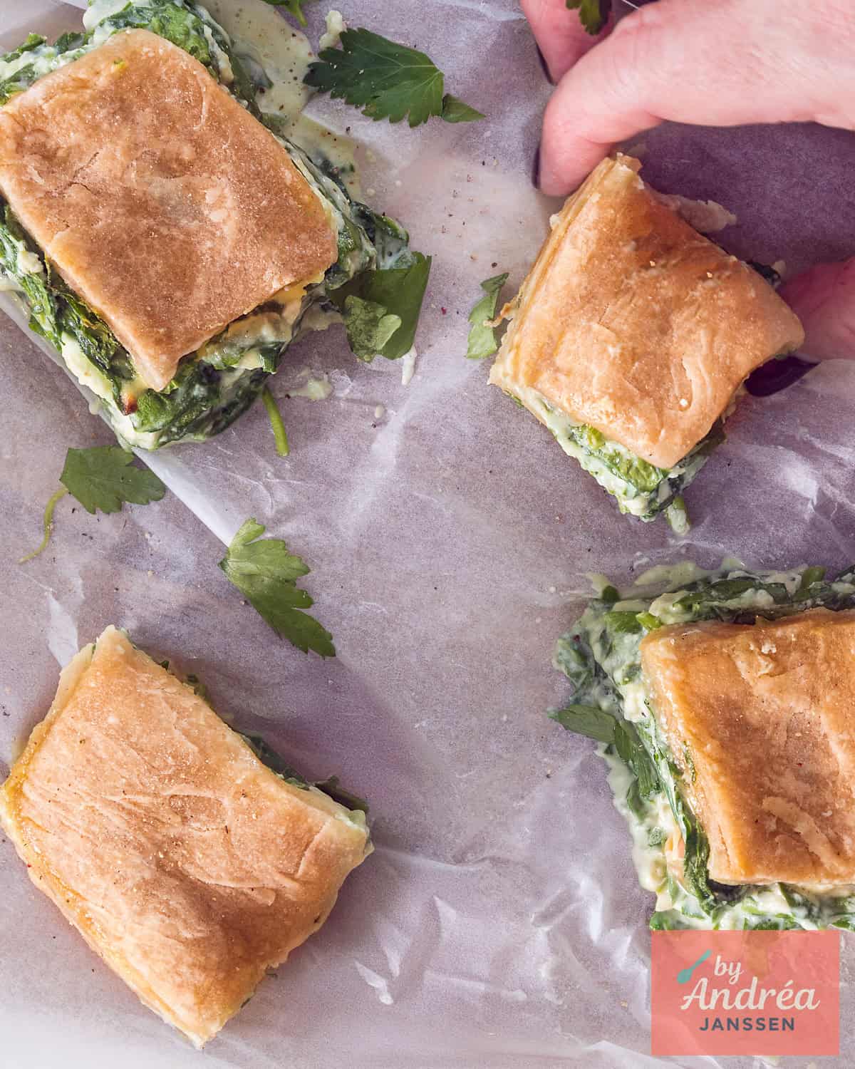 A photo from above of katmer pie cubes with spinach ricotta filling