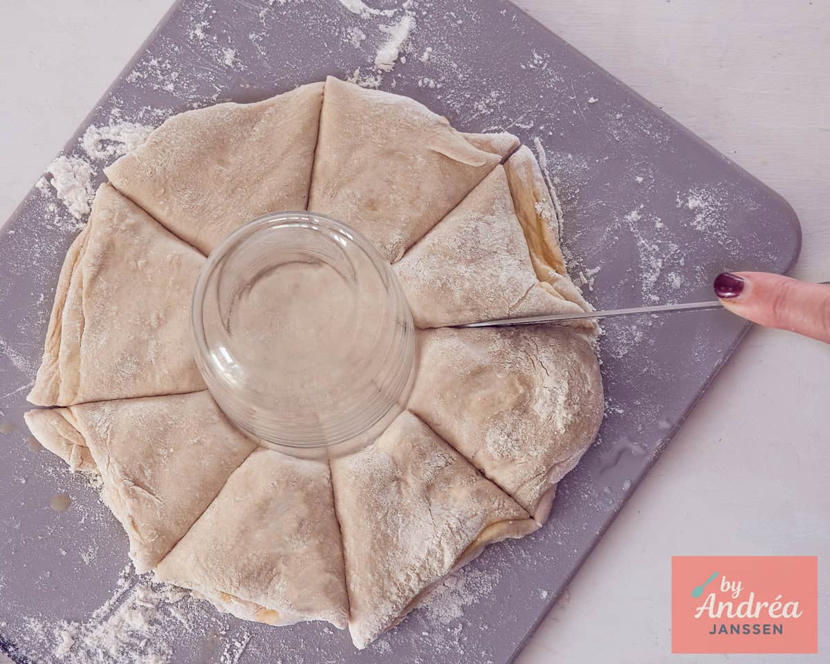 Score the katmer dough in the middle with a glass.