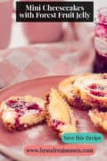 Mini Cheesecakes with Forest Fruit Jelly. A text on top: Mini Cheesecakes with Forest Fruit Jelly