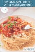 A plate of spaghetti with a creamy mascarpone minced meat sauce. A text: creamy spaghetti with mascarpone and minced meat, easy recipe