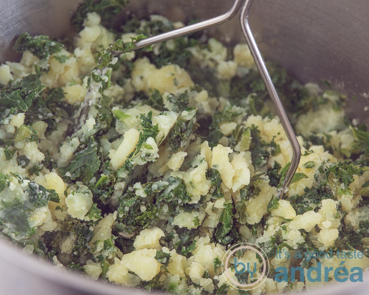 Kale and potatoes mashed in a pan