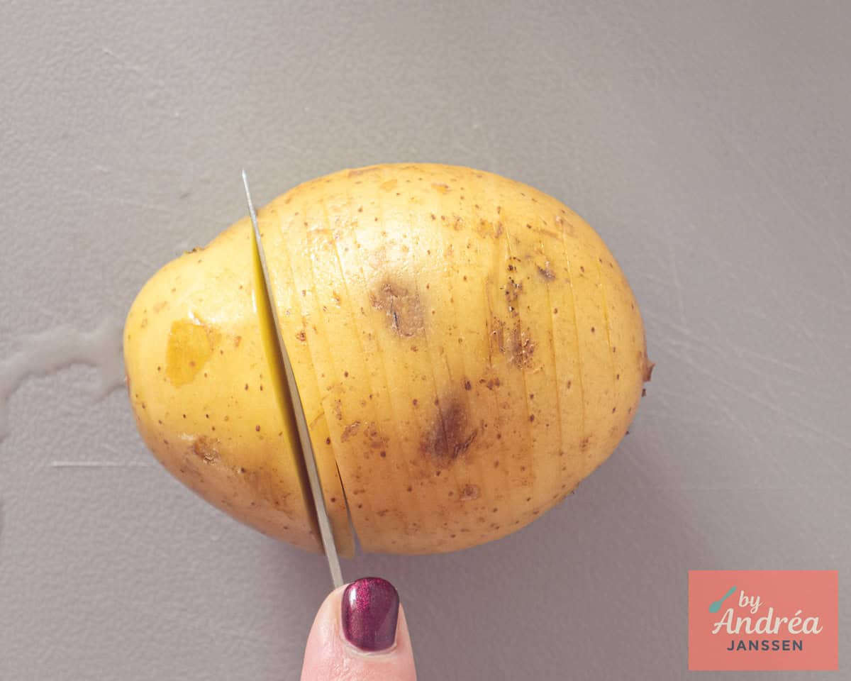 A potato cut into thin slices