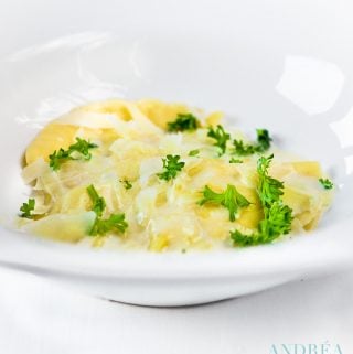 Ravioli filled with cheeses in a white deep dish