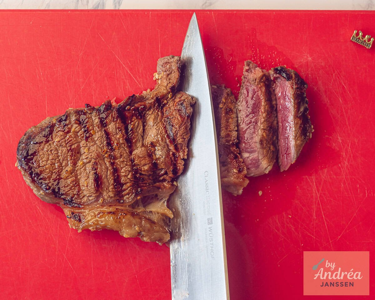 Cutting sirloin steak into slices