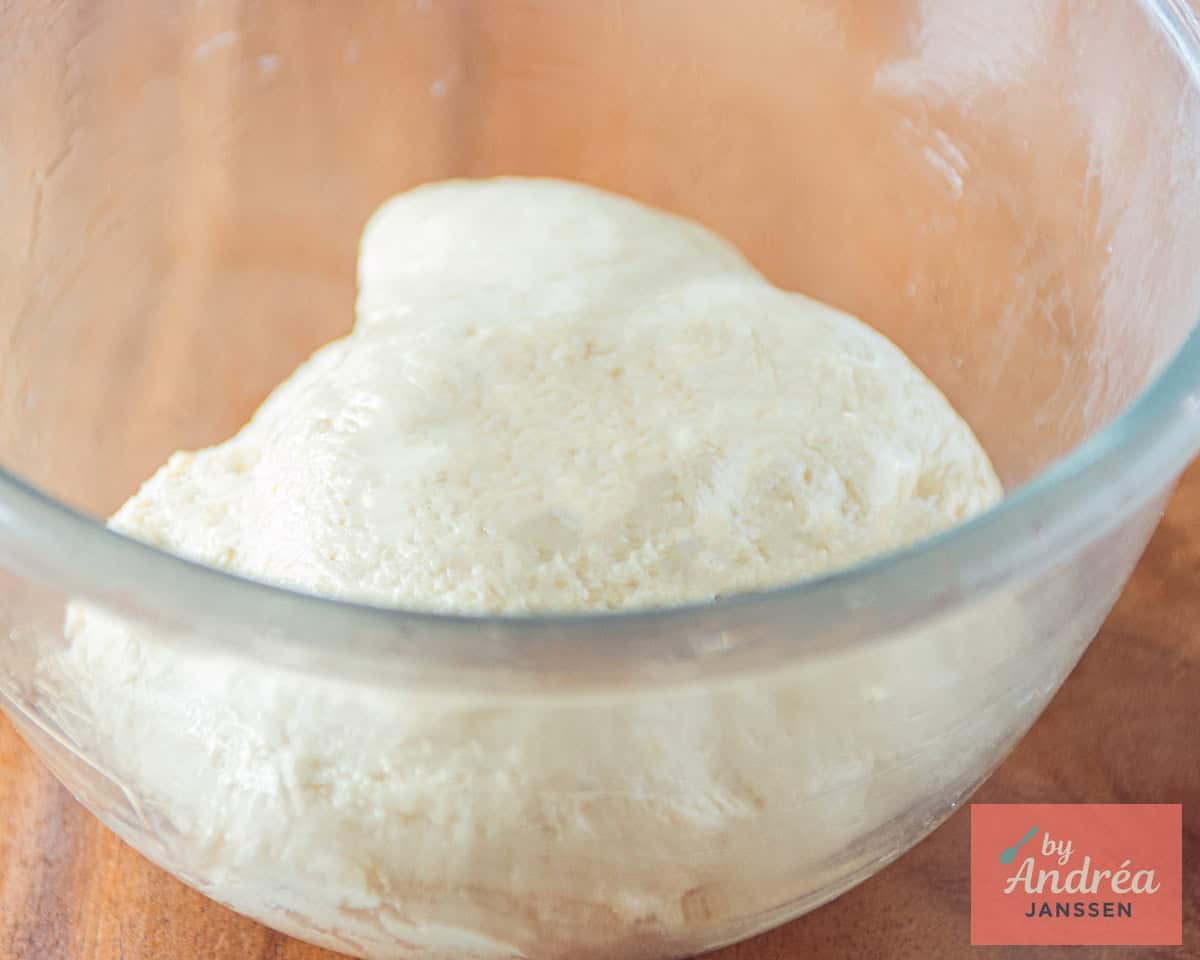 Dough in a glass bowl