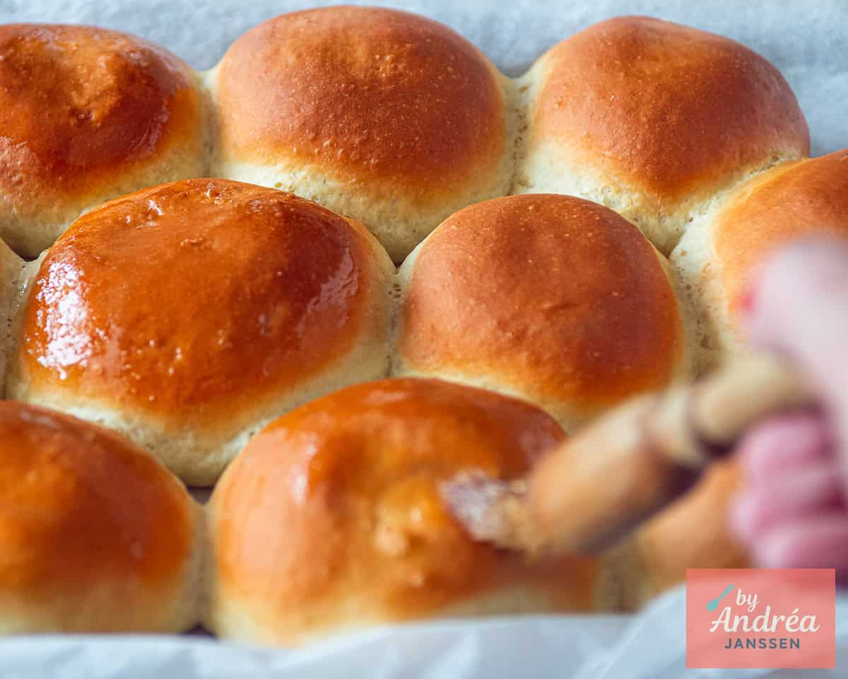 Baked buns brushed with melted butter