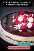 Part of a white chocolate forest fruit cheesecake on a black background. A text on top: White Chocolate Forest Fruit Cheesecake (No Bake)