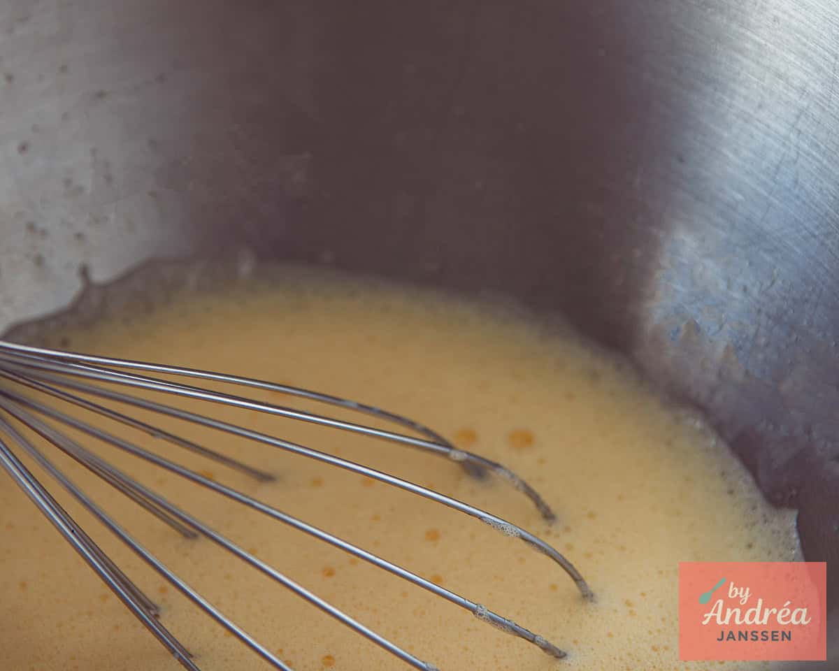 Whisk the egg yolks with the sugar