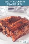 A portion of a plate with sticky spareribs on it. A caption reads: Easy recipe, Sticky Bourbon Soy Glazed Ribs