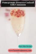 Sparkling Pomegranate Prosecco Cocktail, a text on top: Pomegranate Prosecco Cocktail with Cinnamon