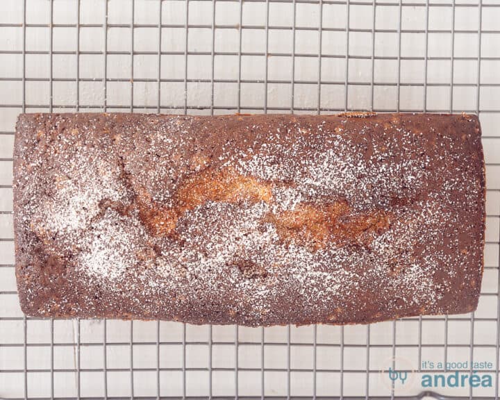 A cake cooling on a rack.