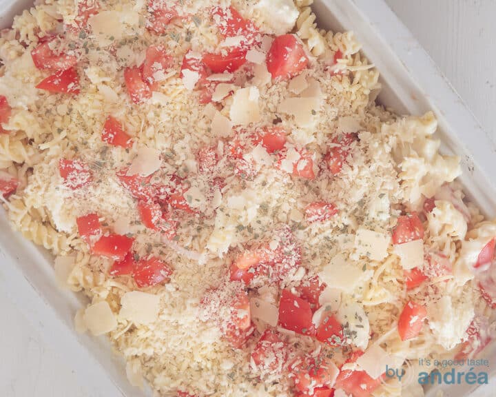 A pasta casserole from above with tomato and delicious cheeses.