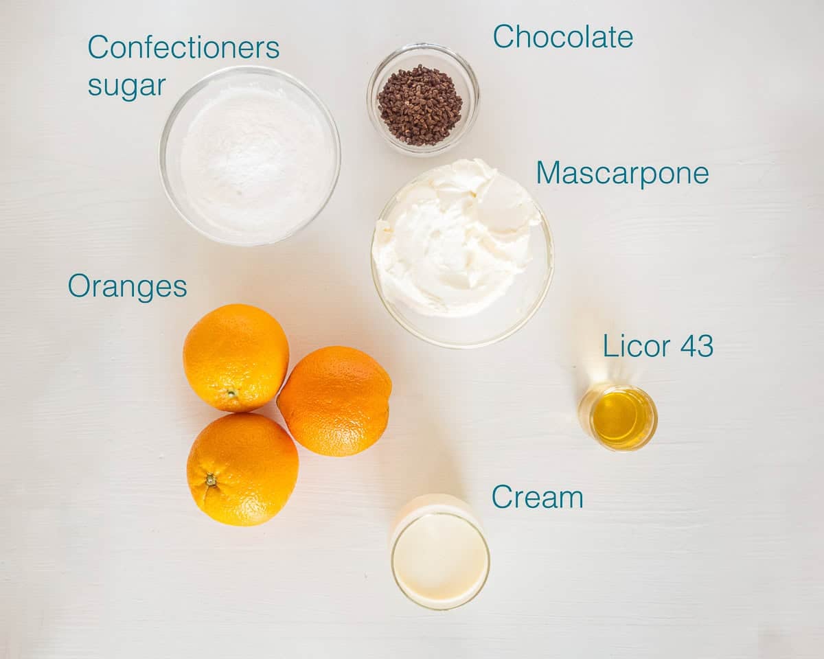 Ingredients Orange Semifreddo with Licor 43 on a white background with text description