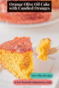 An orange cake with a fork taking a bite. A text: Orange Olive Oil Cake with Candied Oranges.