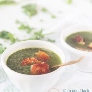 a white bowl bok choy and kale spinach soup with Halloumi on white background