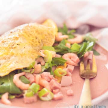 a plate with a Shrimp omelet recipe on a towel