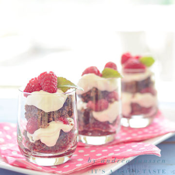 three glasses with Raspberry Brownie tiramisu on a pink napkin