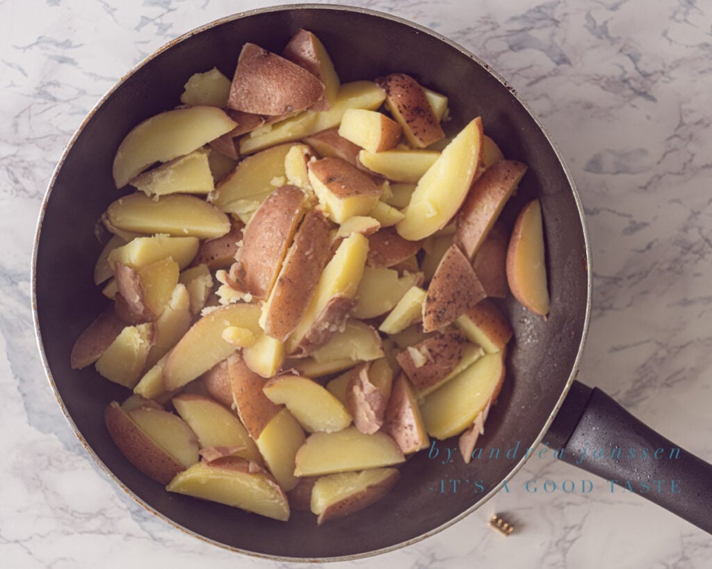 Potatoes baked in a frying pan
