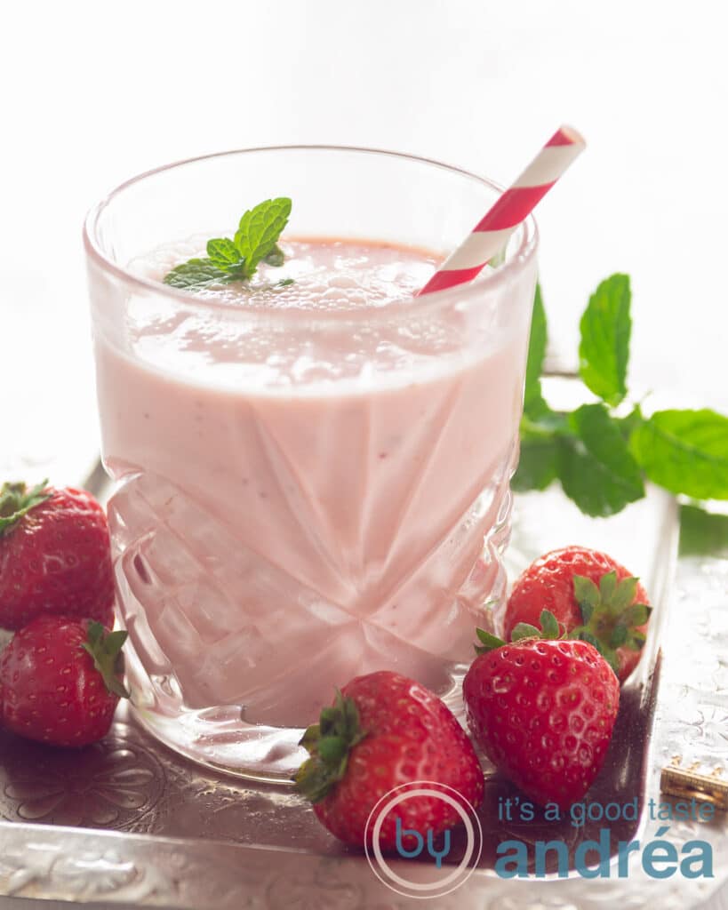 A glass with a Strawberry yogurt smoothie