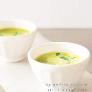 two bowls of soup with fresh peas
