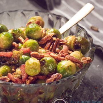 A bowl with Brussels sprouts, bacon and pecans