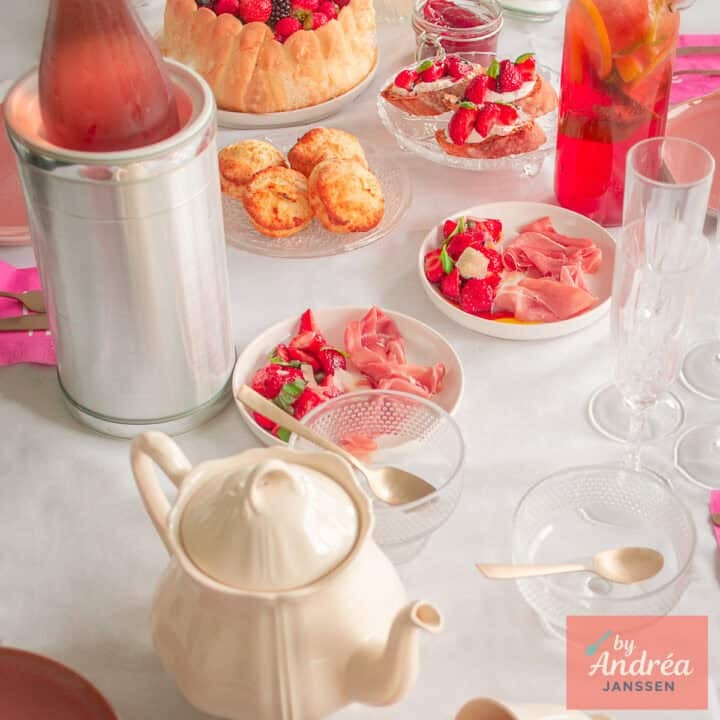 A square photo with high tea with strawberries recipes.