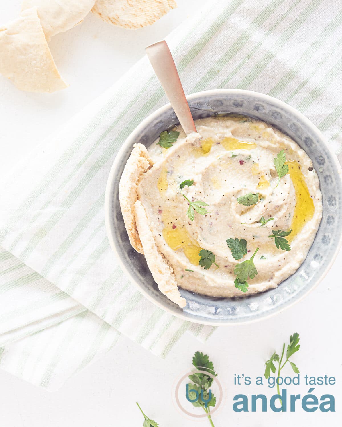 top photo of a grey bowl filled with Greek roasted eggplant dip.