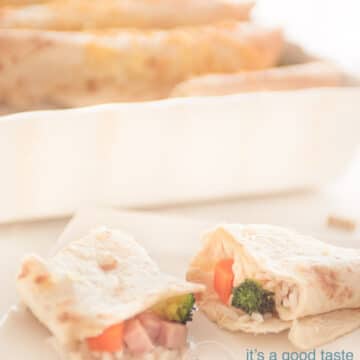 Two half wraps filled with rice, carrots, broccoli and ham and a casserole in the background
