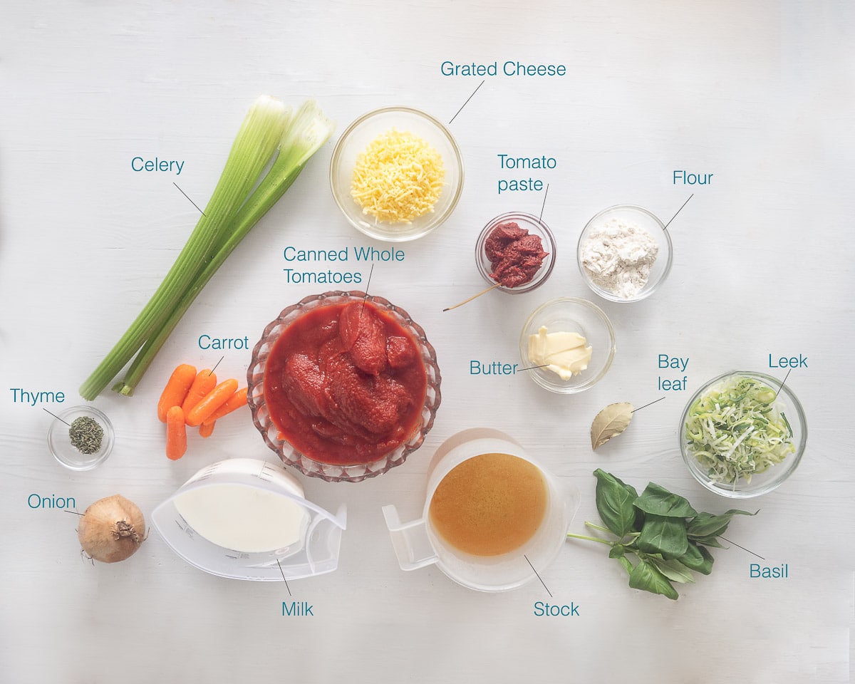 Ingredients Crock pot tomato soup recipe on a white background with text description