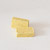 two chicken stock cubes on a white background