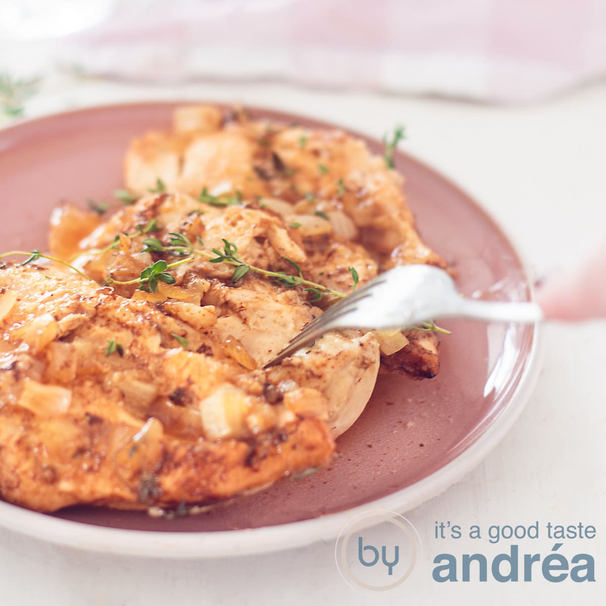 A square photo with a pink plate on the left showing a chicken breast smothered in a garlic brown sugar sauce. A fork pierces the meat. A white background