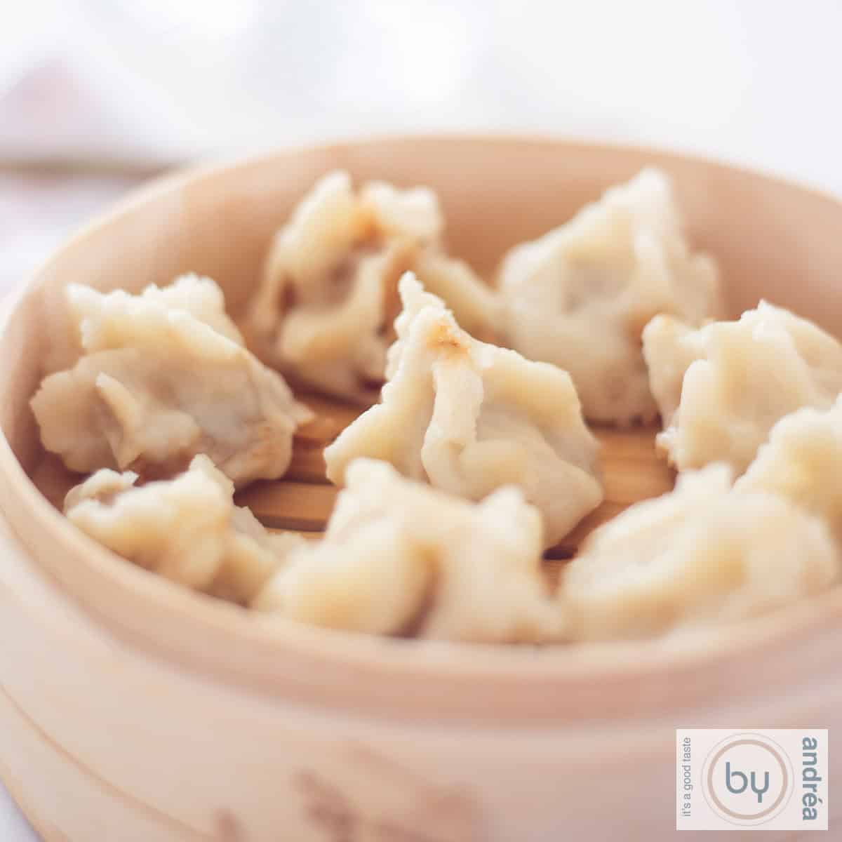 Ukadiche Modak in a steamer basket on a white background